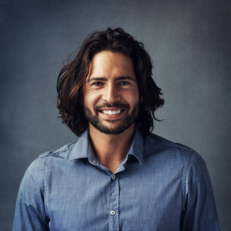 business-man-long-hair-studio-portrait-smile-with-confidence-pride-formal-shirt-by-background-person-model-happy-clothes-fashion-style-creative-career-barcelona_590464-431770